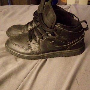 Black Nike Jordan 1s